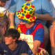 Jason Benetti and AJ Pierzynski didn't miss the chance to laugh at a fan serving his fantasy football punishment in clown attire. Photo Credit: Fox