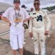 Brendon poses for a photo with NASCAR driver Armani Williams at a NASCAR Cup Series race at the New Hampshire Motorspeedway in New Hampshire. [Provided by Cole Klassen]